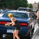 Illustration for article titled Noir Leather Bikini Car Wash Meetup Pictures